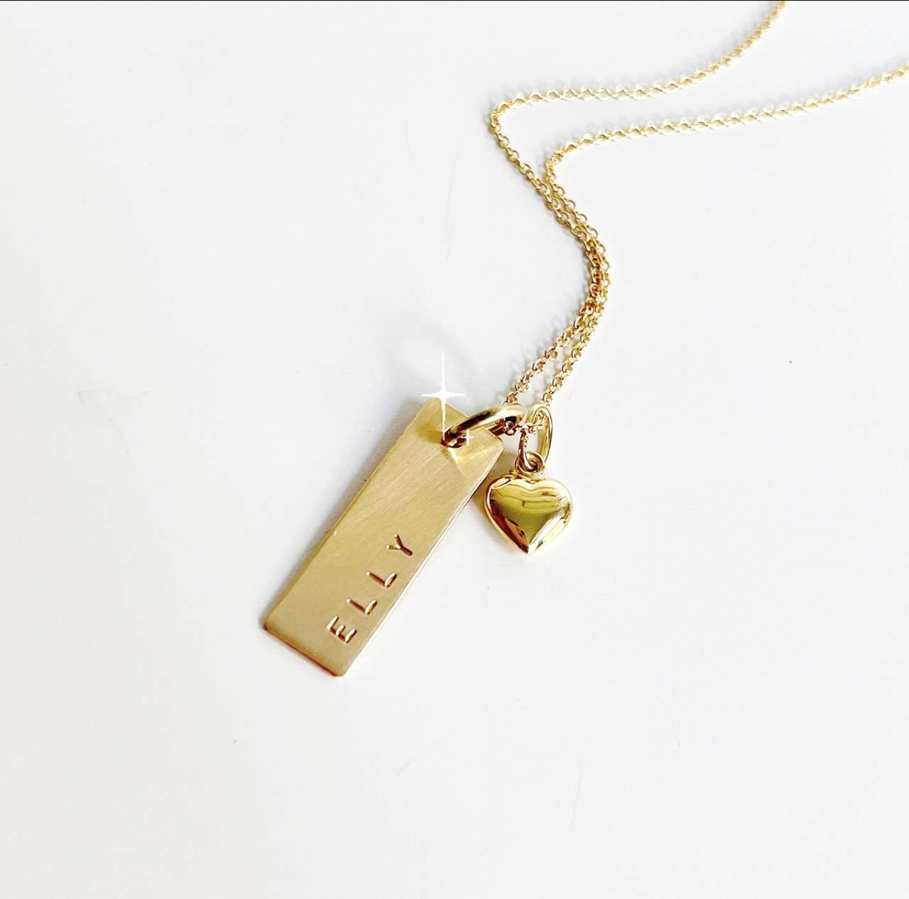namnbricka i guld